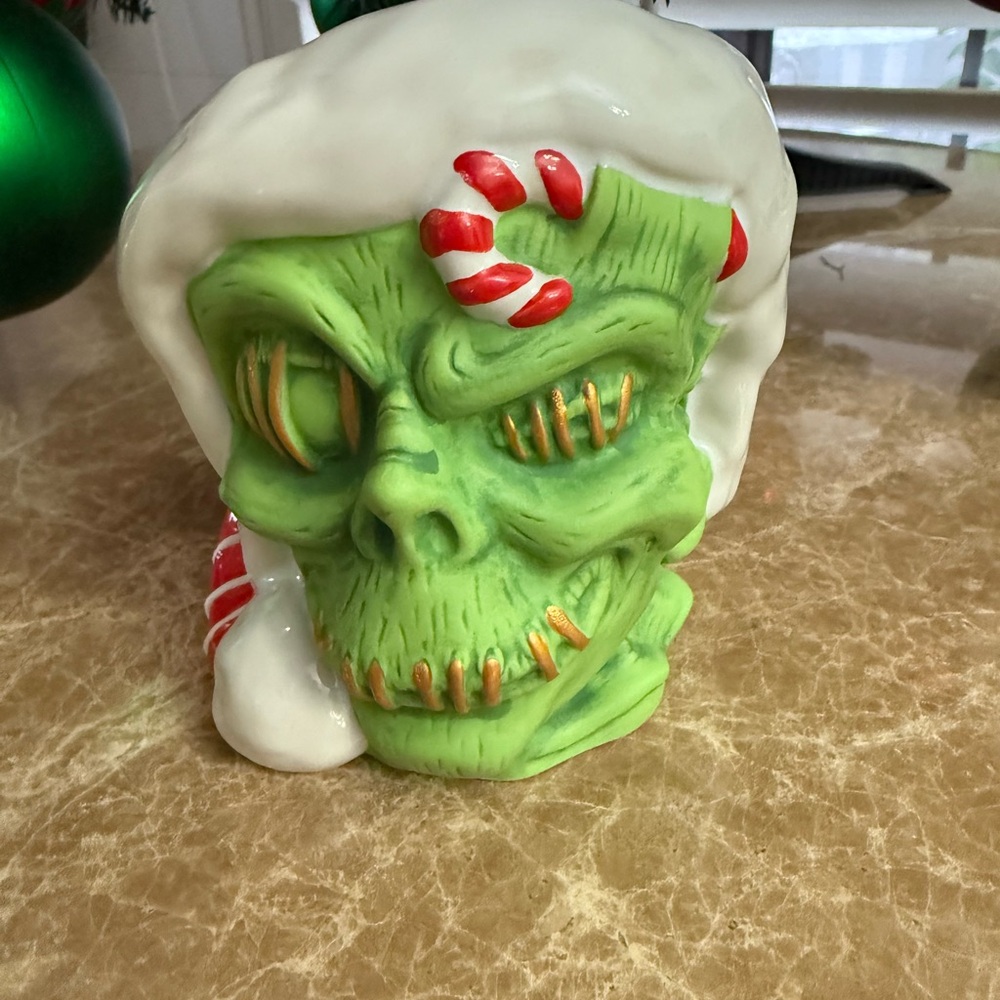 Disney Green and White Skull Figurine